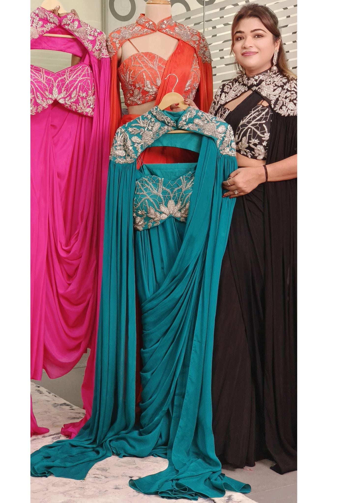 A stylish and sophisticated ensemble featuring a beautifully embroidered cape paired with tailored Palazzo, Perfect for any event. DRY WASH-