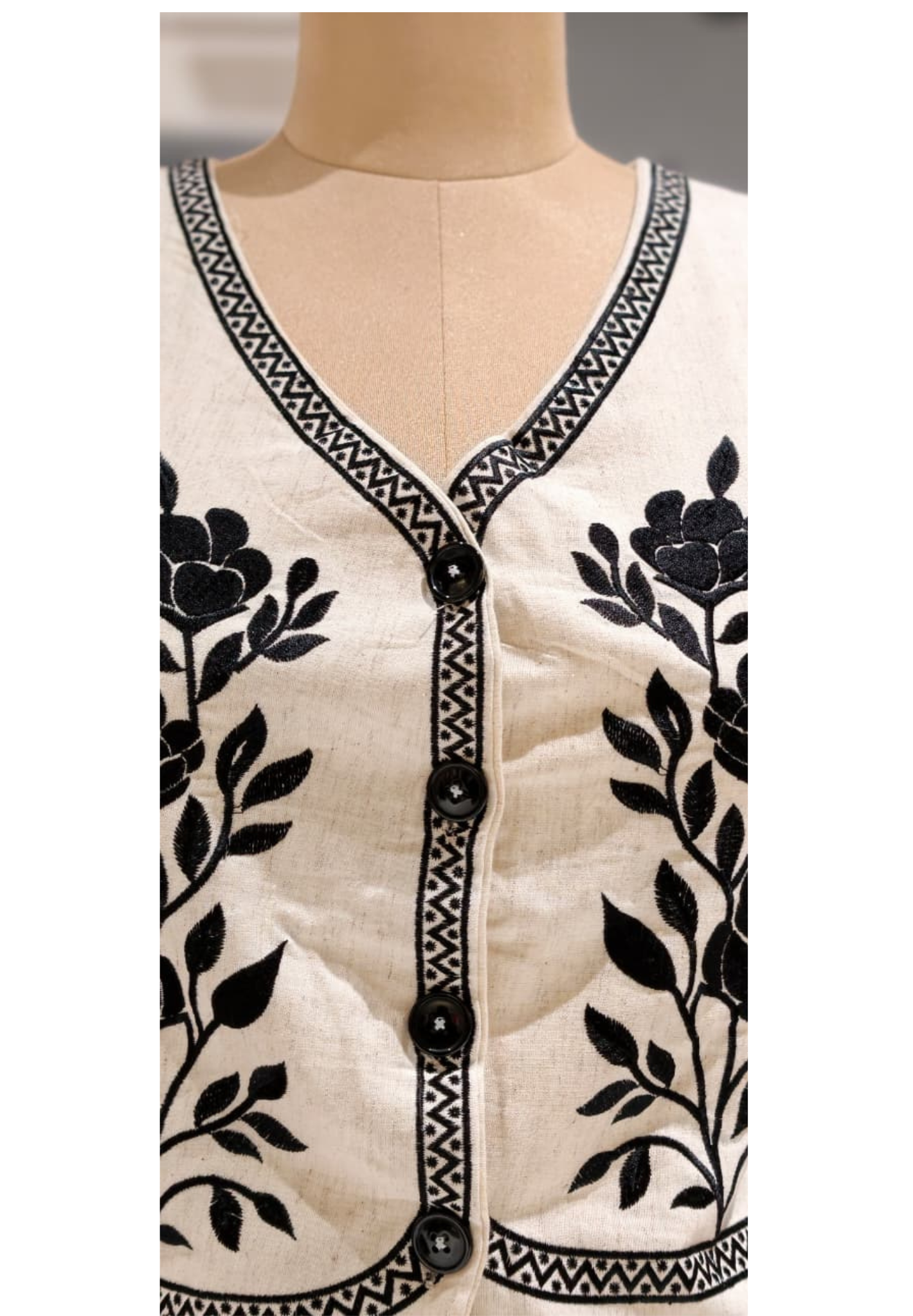 Rosy Embroidered Button Accent Stylish Outlined Half Jacket- 15463