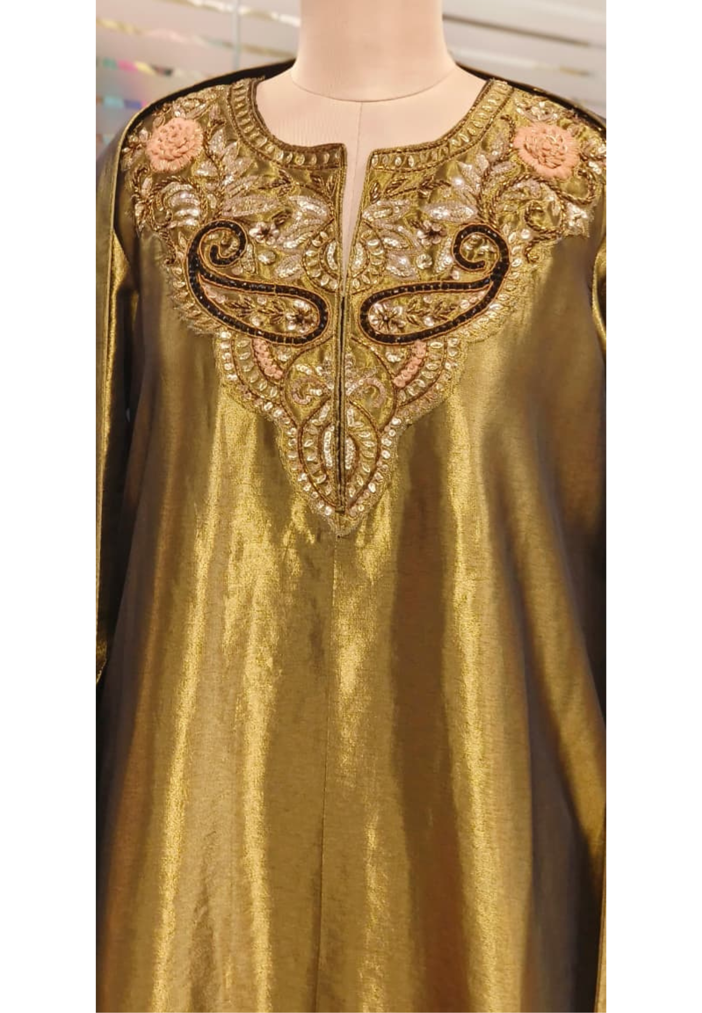 Rich Pure Tissue Fabric Kurta in Metallic Tone with Mirror and Thread Embroidery and Delicate Tassel Border