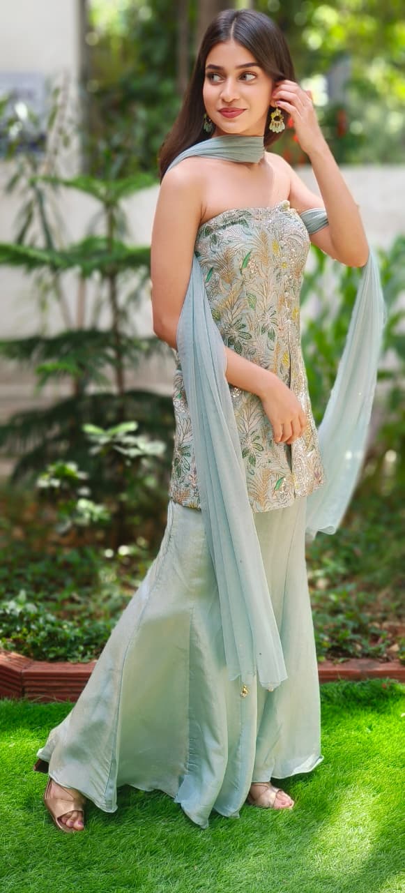 Pearl Shine Palazzo Ensemble Thread Embroidered Front Slit Sleeveless Kurta With Tapered Palazzo Bottom In Tissue Fabric (DISPATCHING AFTER 25 DAYS ON ORDERS EXCEPT FOR 38 SIZE)