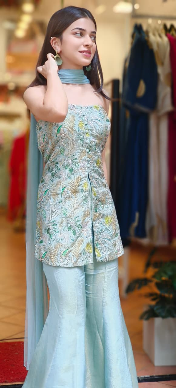 Pearl Shine Palazzo Ensemble Thread Embroidered Front Slit Sleeveless Kurta With Tapered Palazzo Bottom In Tissue Fabric (DISPATCHING AFTER 25 DAYS ON ORDERS EXCEPT FOR 38 SIZE)