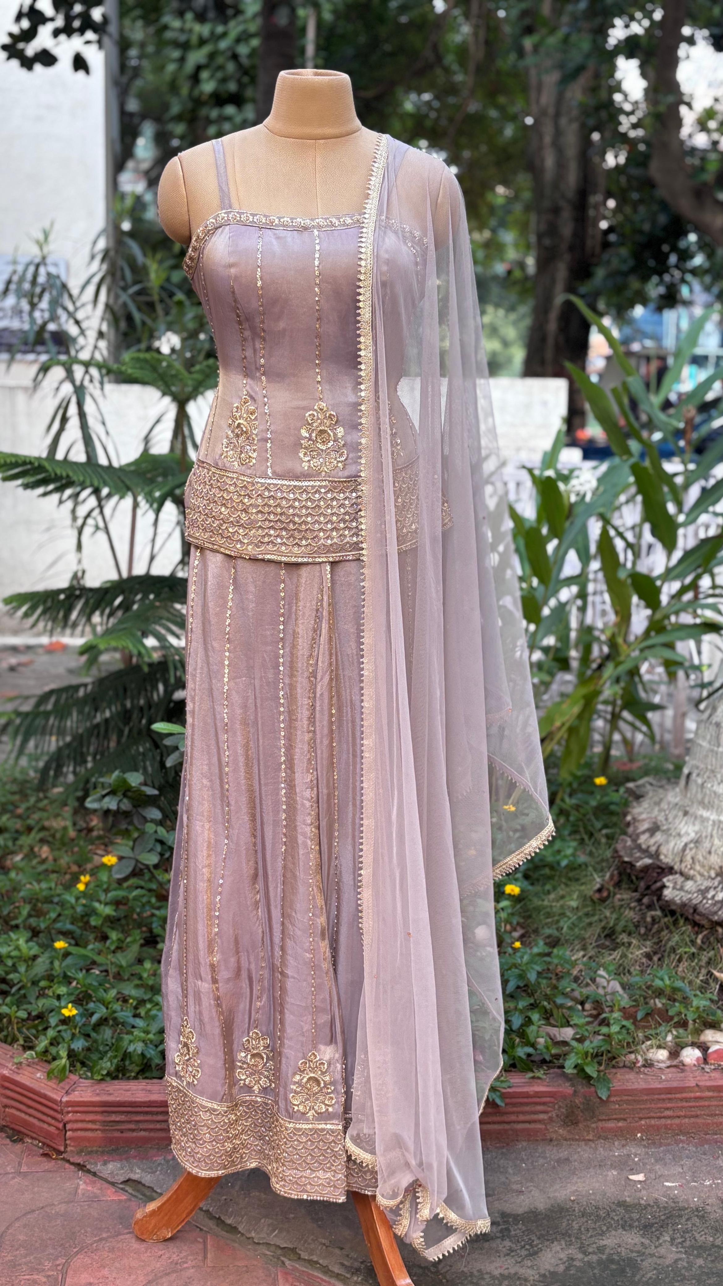 Zardosi Charm Tiny Foil Handwork Sleeveless Short Kurta With Loose Palazzo Bottom In Tissue Fabric & Netted Dupatta-