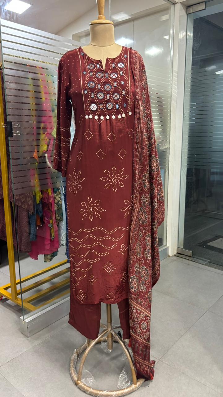 Beautiful Foil Mirror Work Tasselled Full Suit With Ajrak Print Dupatta In Crepe Fabric
