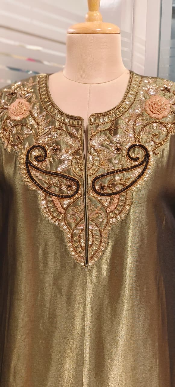 Rich Pure Tissue Fabric Kurta in Metallic Tone with Mirror and Thread Embroidery and Delicate Tassel Border