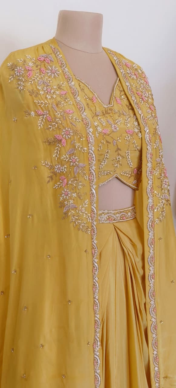 Yellow Embroidered Crop Top and Draped Skirt Set with Elegant Cape Jacket