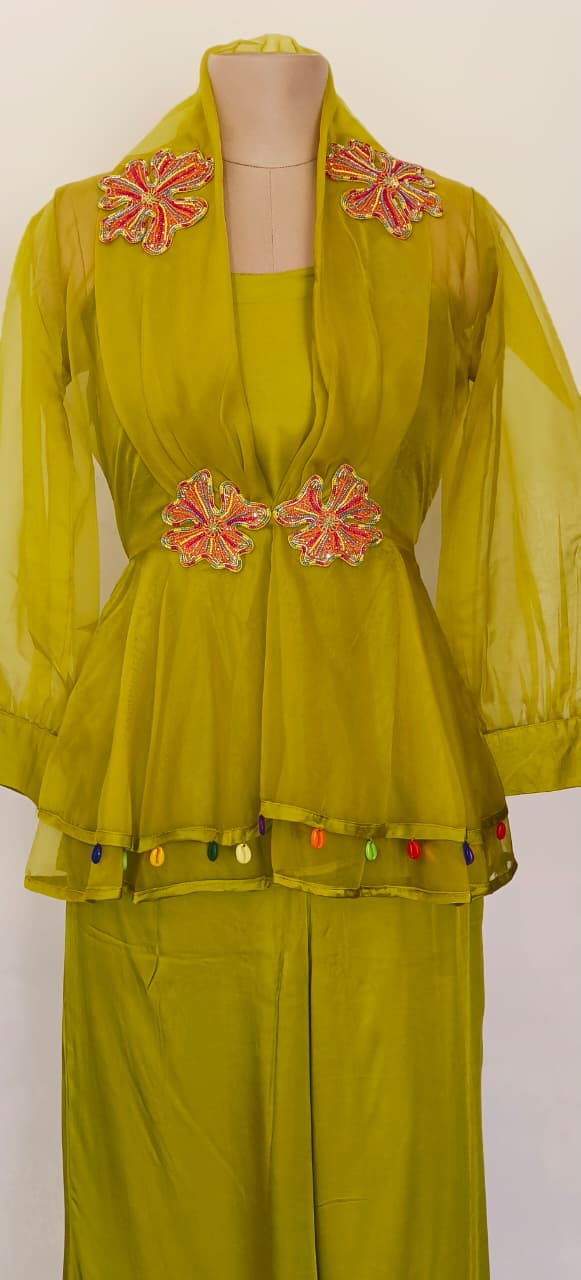 Contemporary Lime Green Peplum Kurta and Palazzo Set with Intricate Floral Work and Playful Tassel Highlights