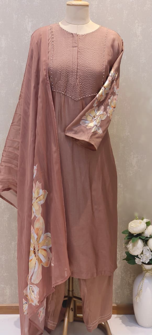 Chic Daily-Wear Suit Adorned with Handcrafted Smocking, Stylish Sleeve Motifs & Soft Floral Dupatta