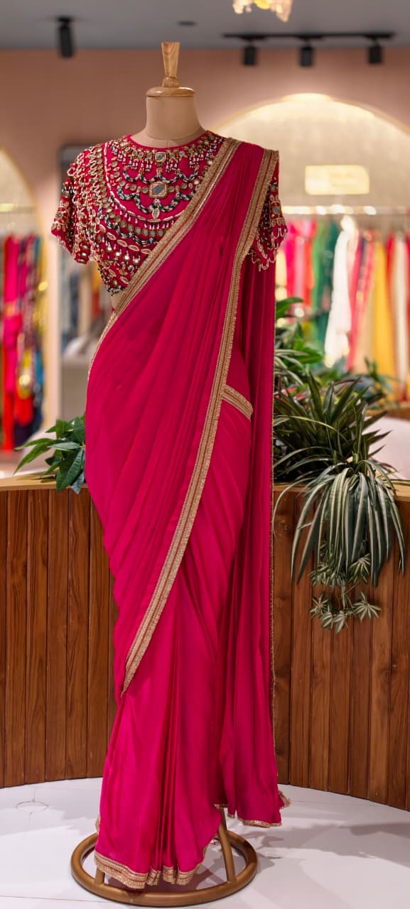 Rani Pink Pre-Draped Saree with Fine Gold Gotta Border Paired with Luxury Hand-Embroidered Jeweled Blouse Featuring Emerald & Polki Motifs- 14777