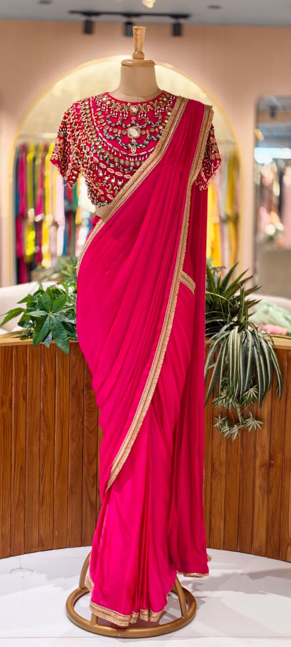 Rani Pink Pre-Draped Saree with Fine Gold Gotta Border Paired with Luxury Hand-Embroidered Jeweled Blouse Featuring Emerald & Polki Motifs- 14777