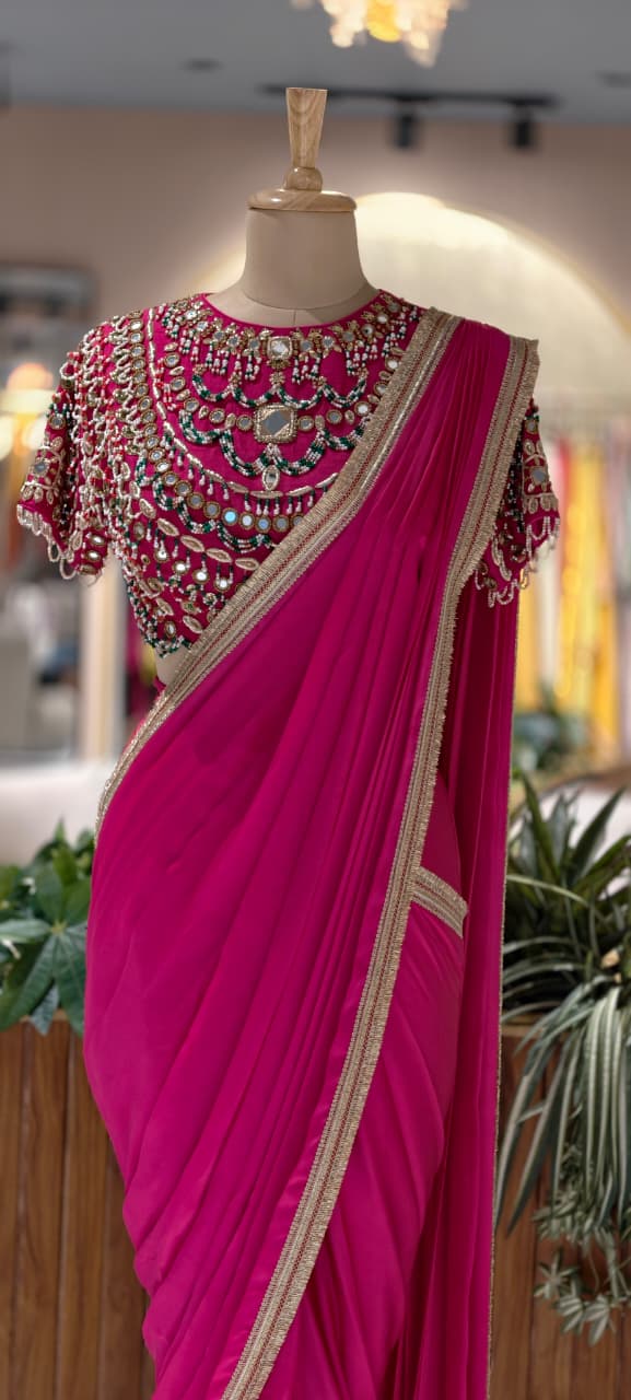 Rani Pink Pre-Draped Saree with Fine Gold Gotta Border Paired with Luxury Hand-Embroidered Jeweled Blouse Featuring Emerald & Polki Motifs- 14777