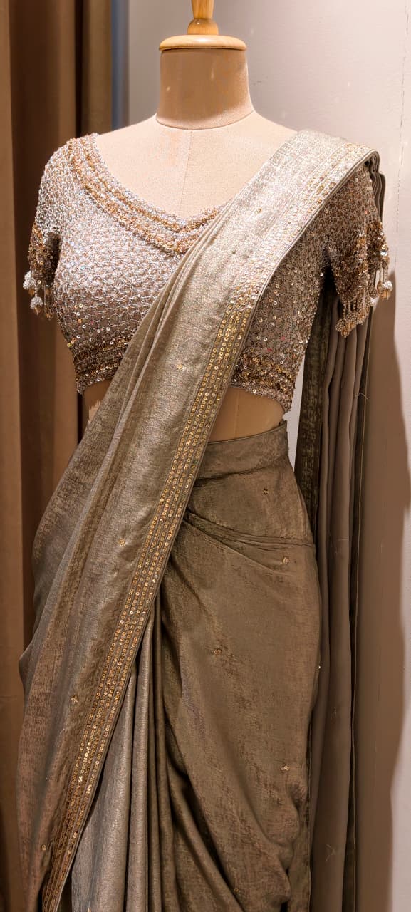 Metallic Gold-Taupe Shimmer Tissue Saree with Embellished Border paired with a Heavy Sequin and Pearl-Fringed Blouse- 14236