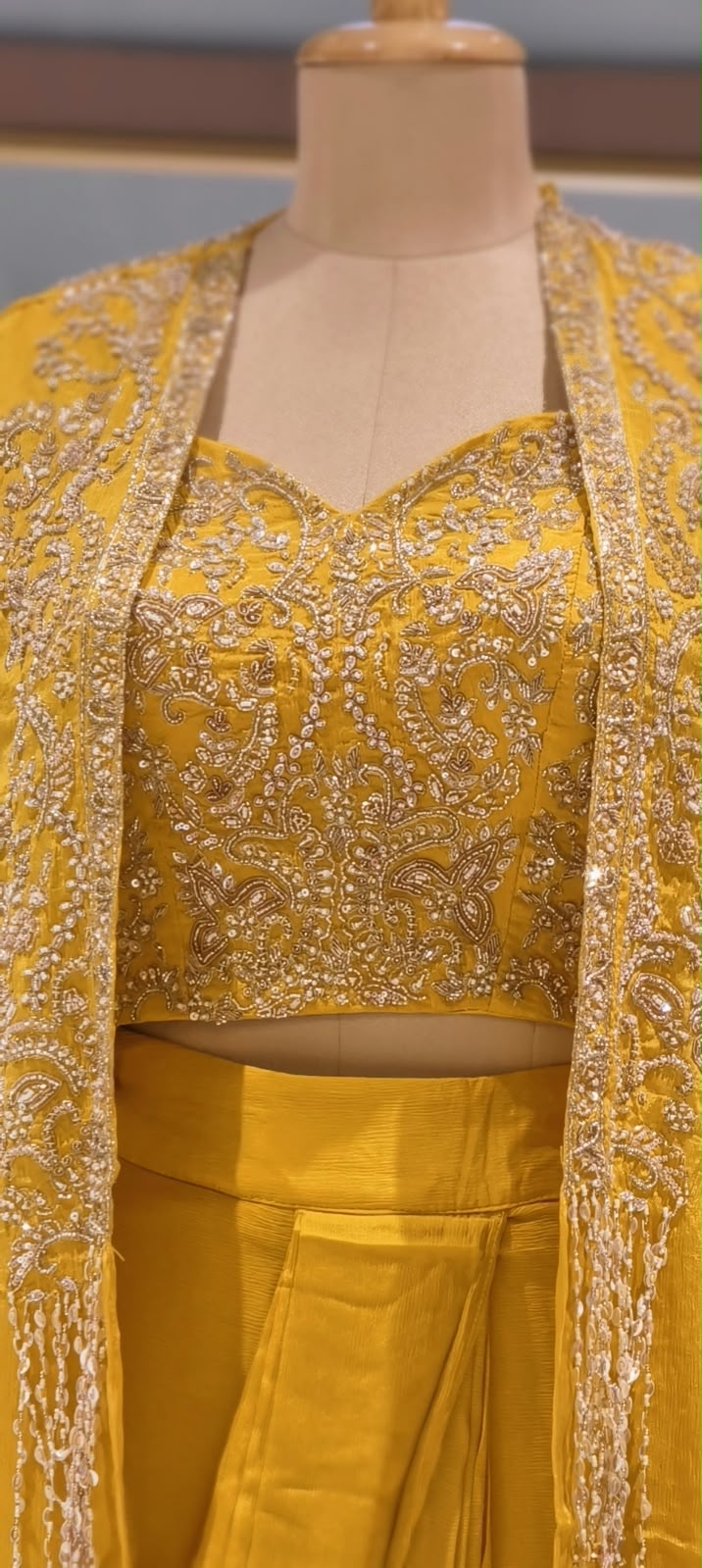 Hand Embellished Bustier With Chinon Drape Skirt Set & Matching Flowy Cape Featuring Intricate Tassels Detailing- 16633