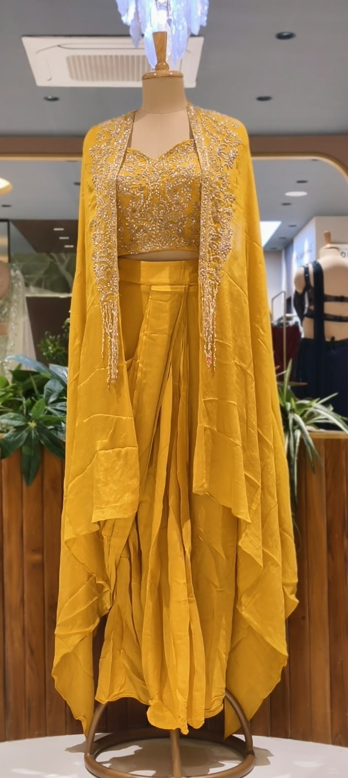 Hand Embellished Bustier With Chinon Drape Skirt Set & Matching Flowy Cape Featuring Intricate Tassels Detailing- 16633