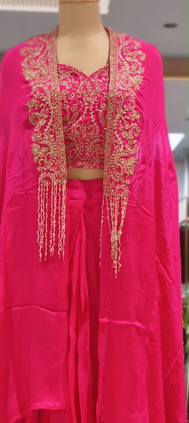 Hand Embellished Bustier With Chinon Drape Skirt Set & Matching Flowy Cape Featuring Intricate Tassels Detailing- 16633