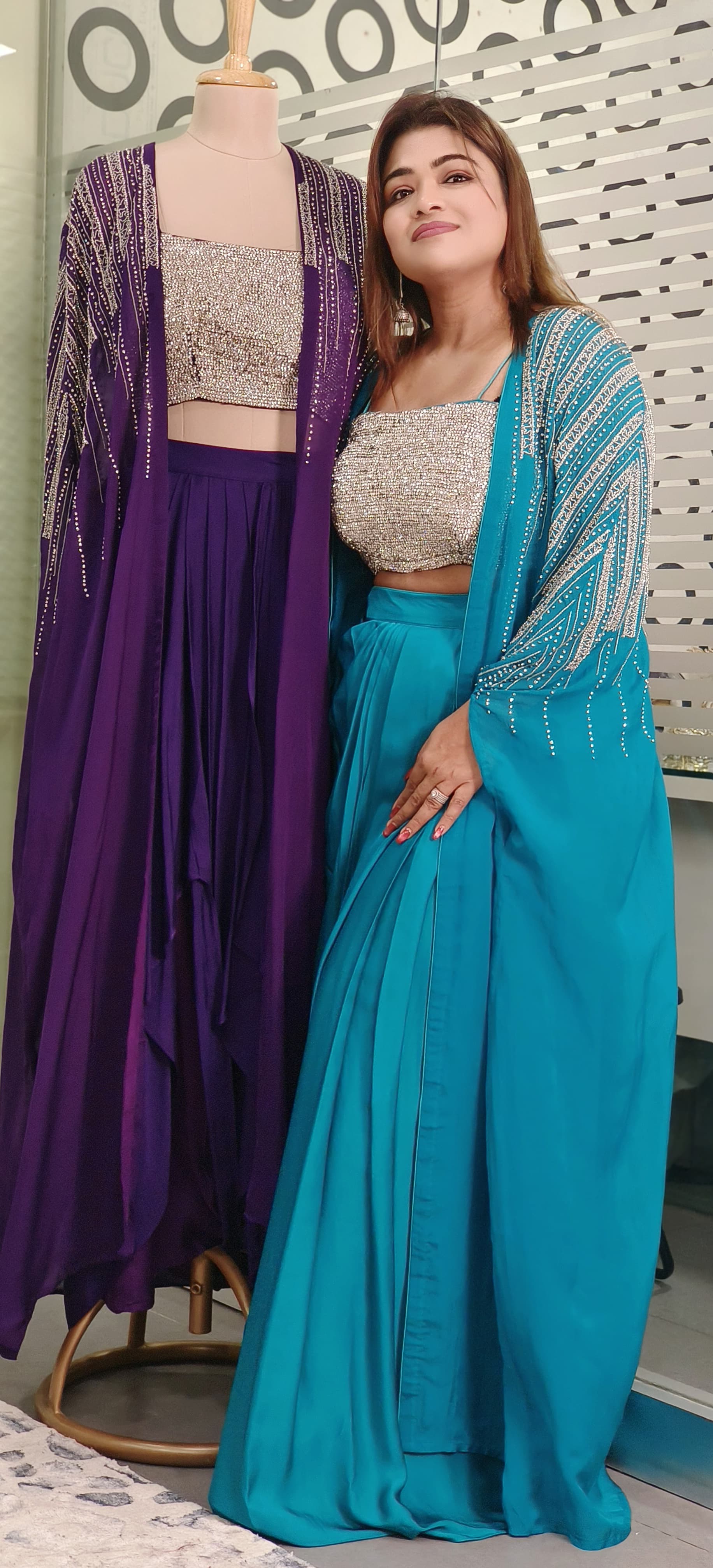 Swarovski-Embellished Top with Draped Skirt Set With organza shrug A luxurious outfit featuring a sparkling Swarovski stone-studded blouse paired with an elegant drape-style skirt DRY WASH