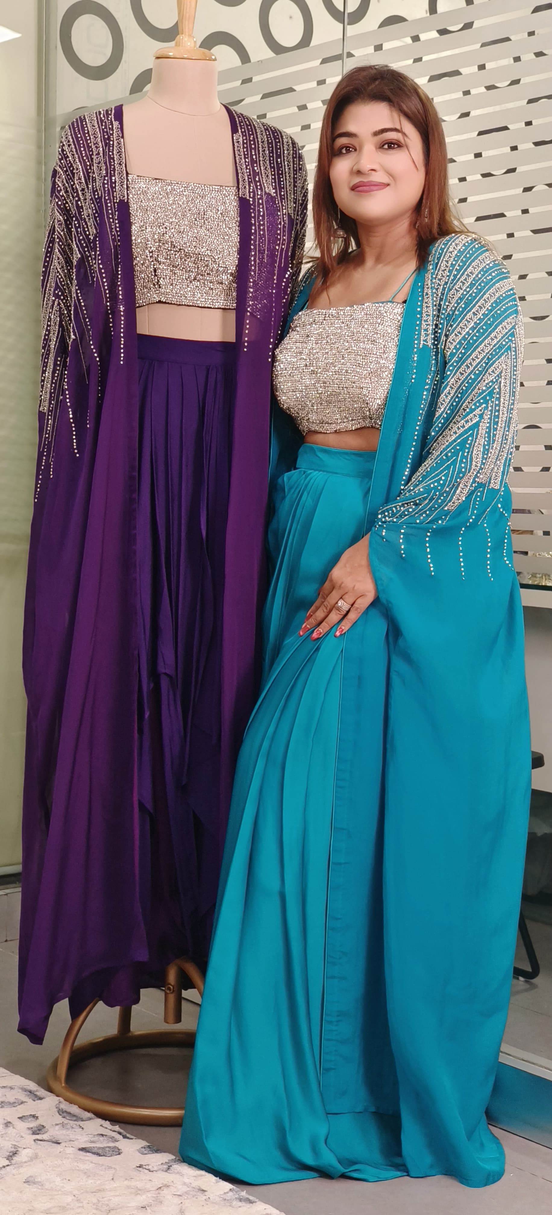 Swarovski-Embellished Top with Draped Skirt Set With organza shrug A luxurious outfit featuring a sparkling Swarovski stone-studded blouse paired with an elegant drape-style skirt DRY WASH