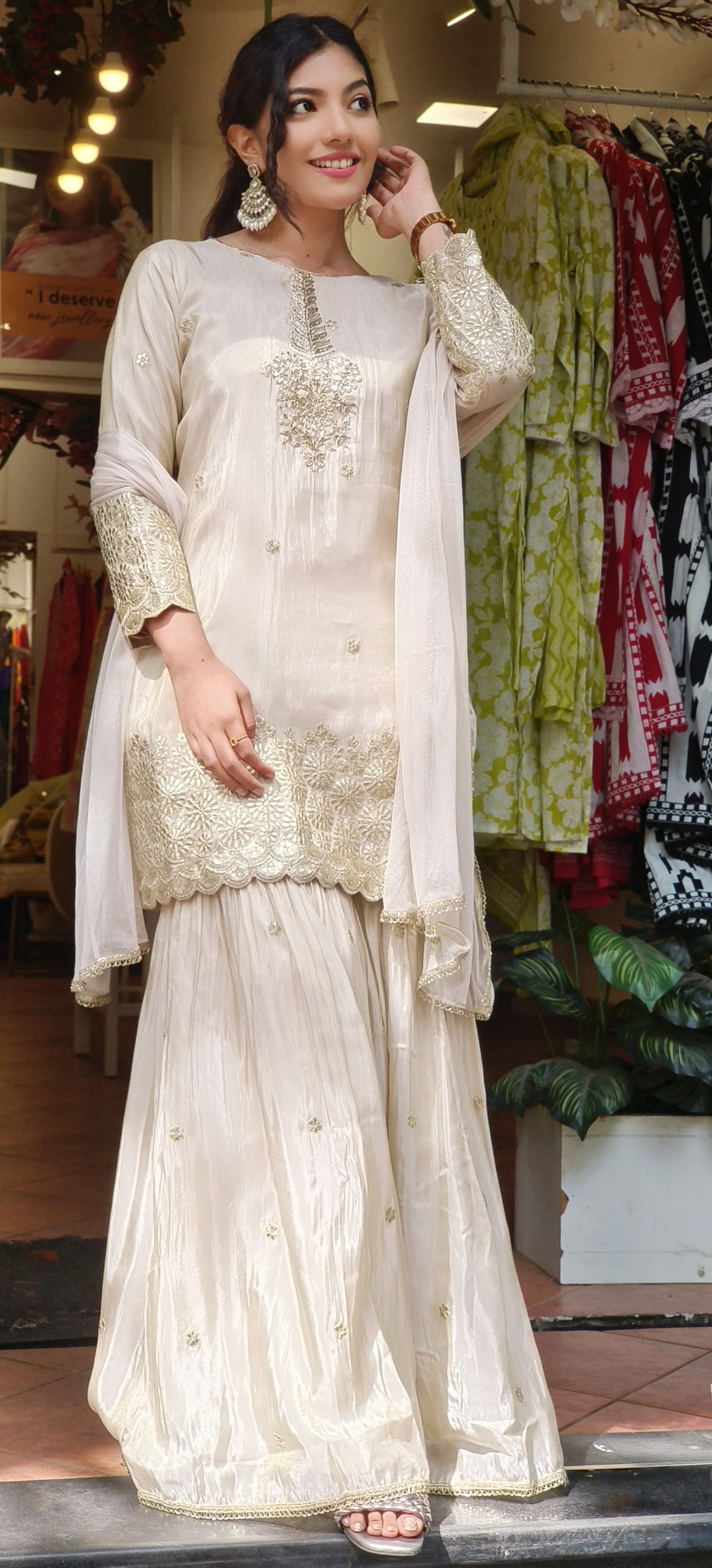 Graceful Ivory Shimmer Tissue Gotta Patti Embroidered Top with Matching Sharara and Netted Dupatta 08471