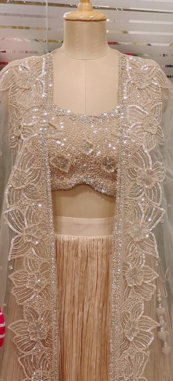 Stylish Sequence Embroidered Floral Cut Work Crop Top With Crushed Lehenga & Netted Shrug