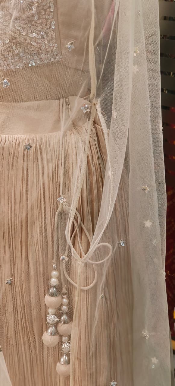 Stylish Sequence Embroidered Floral Cut Work Crop Top With Crushed Lehenga & Netted Shrug