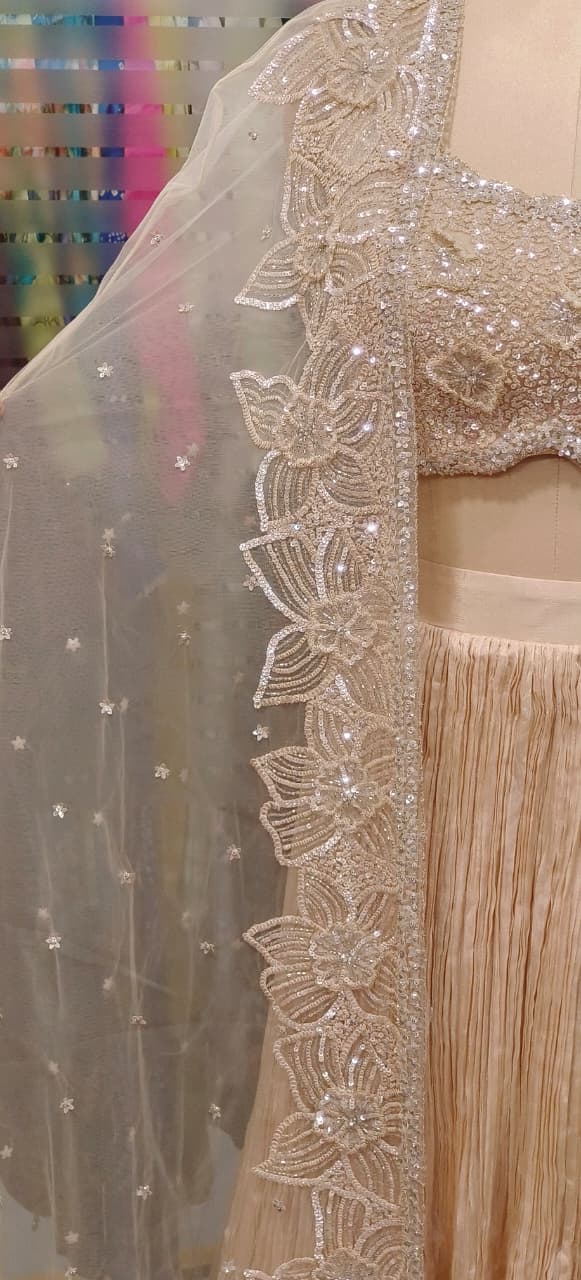 Stylish Sequence Embroidered Floral Cut Work Crop Top With Crushed Lehenga & Netted Shrug