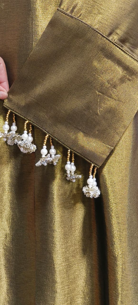 Rich Pure Tissue Fabric Kurta in Metallic Tone with Mirror and Thread Embroidery and Delicate Tassel Border