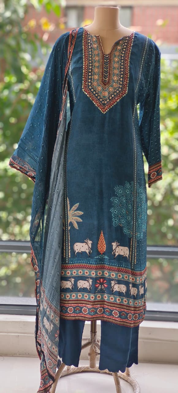 Designer Crepe Suit in Deep Blue Shade Adorned with Sacred Cow Figures and Heritage Prints-12082