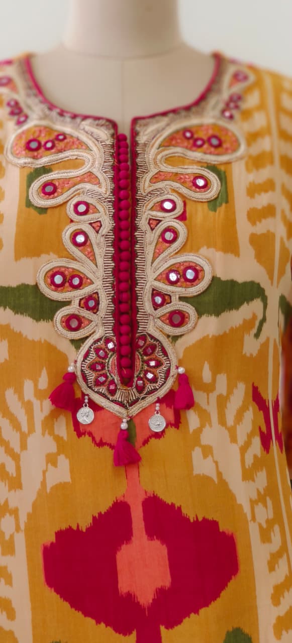 Mustard Ikat Print Crepe Kurta Set with Hand Embroidered Mirror Work Neckline Tassel Detailing With Farsi Salwar-12224