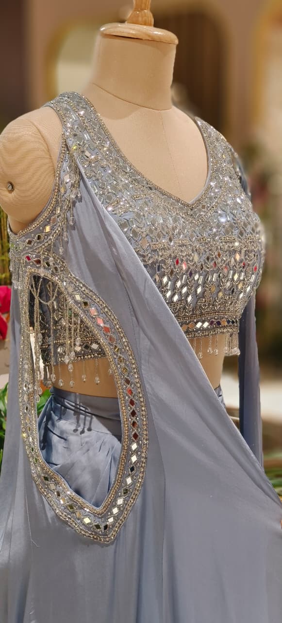 High-Fashion Partywear Drape Skirt Set with Heavy Hand-Embroidered Mirror Blouse, Dramatic Side Cut Drape & Crystal Hangings