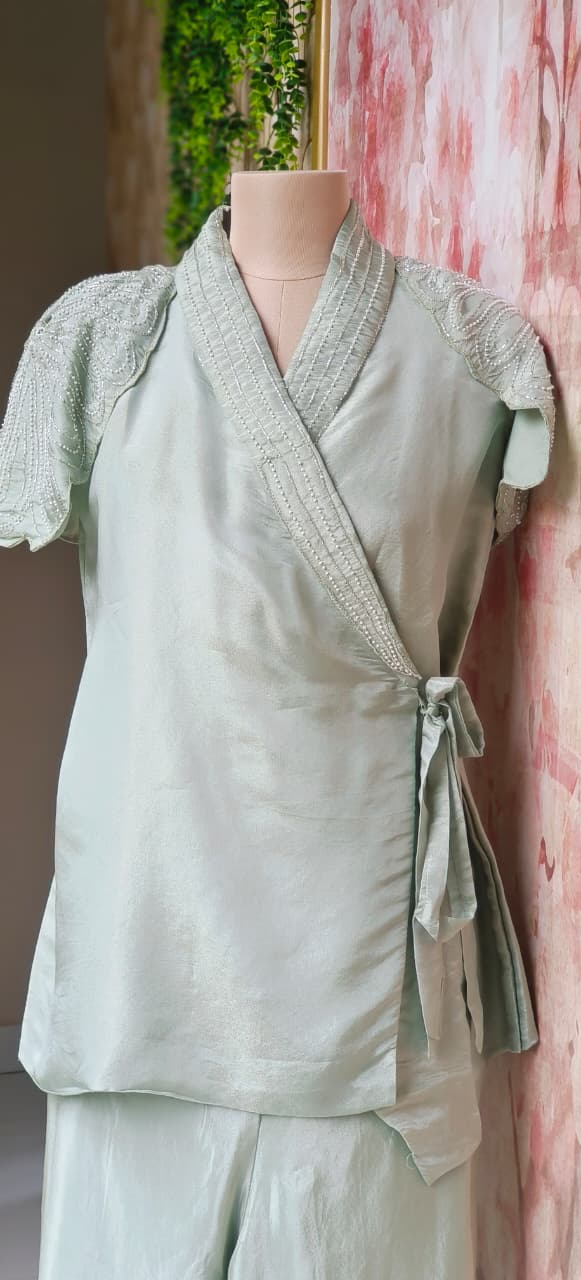 Stylish Indo-Western Co-Ord Set With Hand-Embellished Pearl Work Wrap, Sleeveless Inner and Matching Loose Pants in Shimmer Tissue Fabric-12713,12714