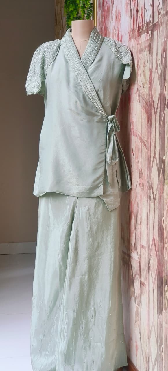 Stylish Indo-Western Co-Ord Set With Hand-Embellished Pearl Work Wrap, Sleeveless Inner and Matching Loose Pants in Shimmer Tissue Fabric-12713,12714