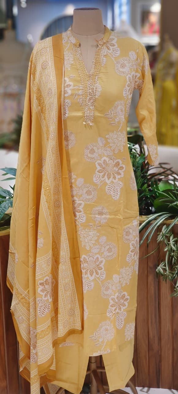 Printed Mustard Cotton Suit Set with Fine Neck Embellishment & Coordinated Bottom