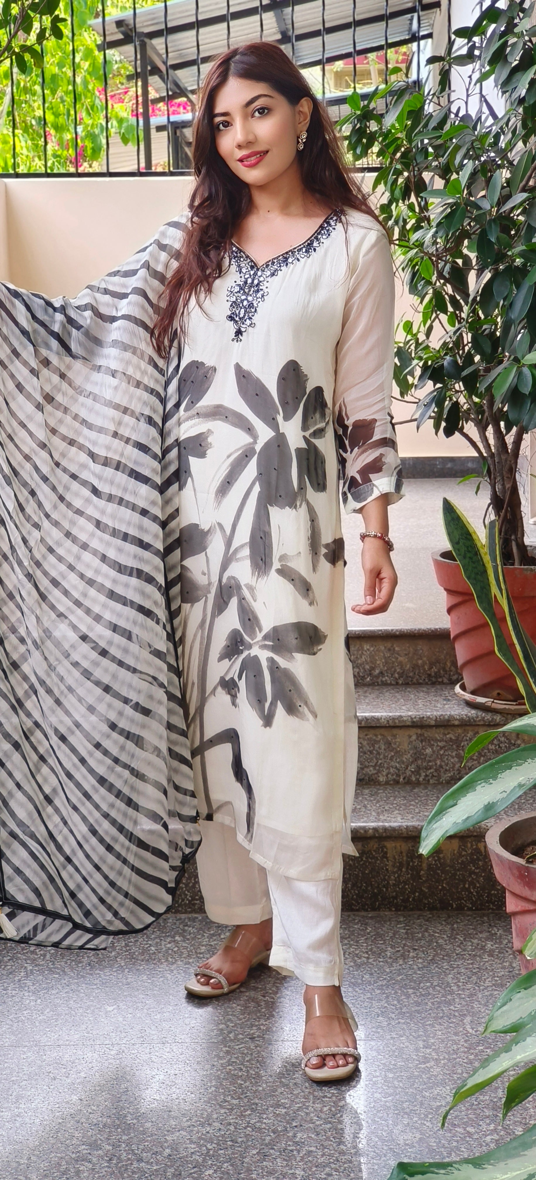 Graceful Hand-Embroidered Full Suit Set in Organza Fabric with Bold Monochrome Floral Design DRYWASH DISPATCHING WILL BE FROM MONDAY-09406