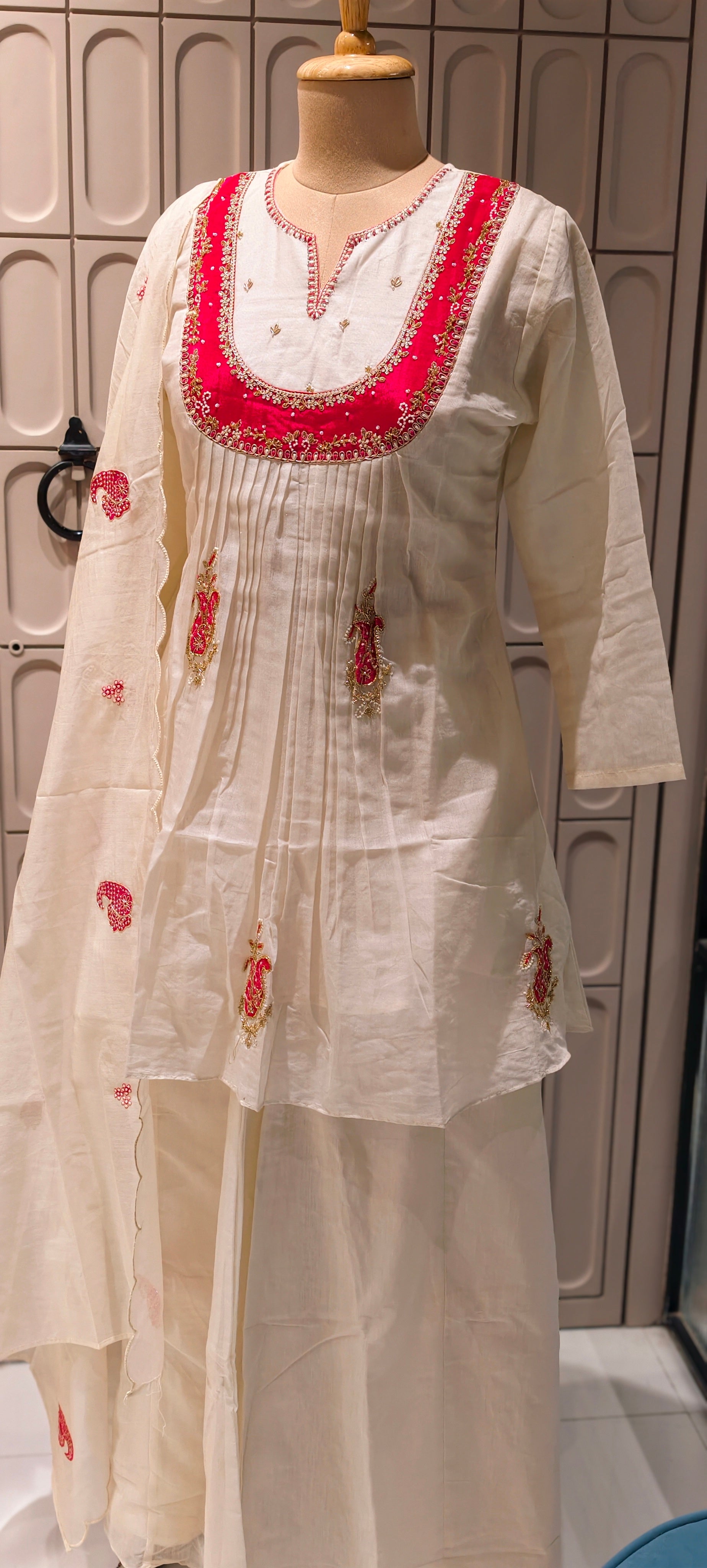 Elegant Ivory MulChanderi Peplum Style Kurta Suit Set with Hand-Embroidered Red Yoke and Festive Motifs-13858
