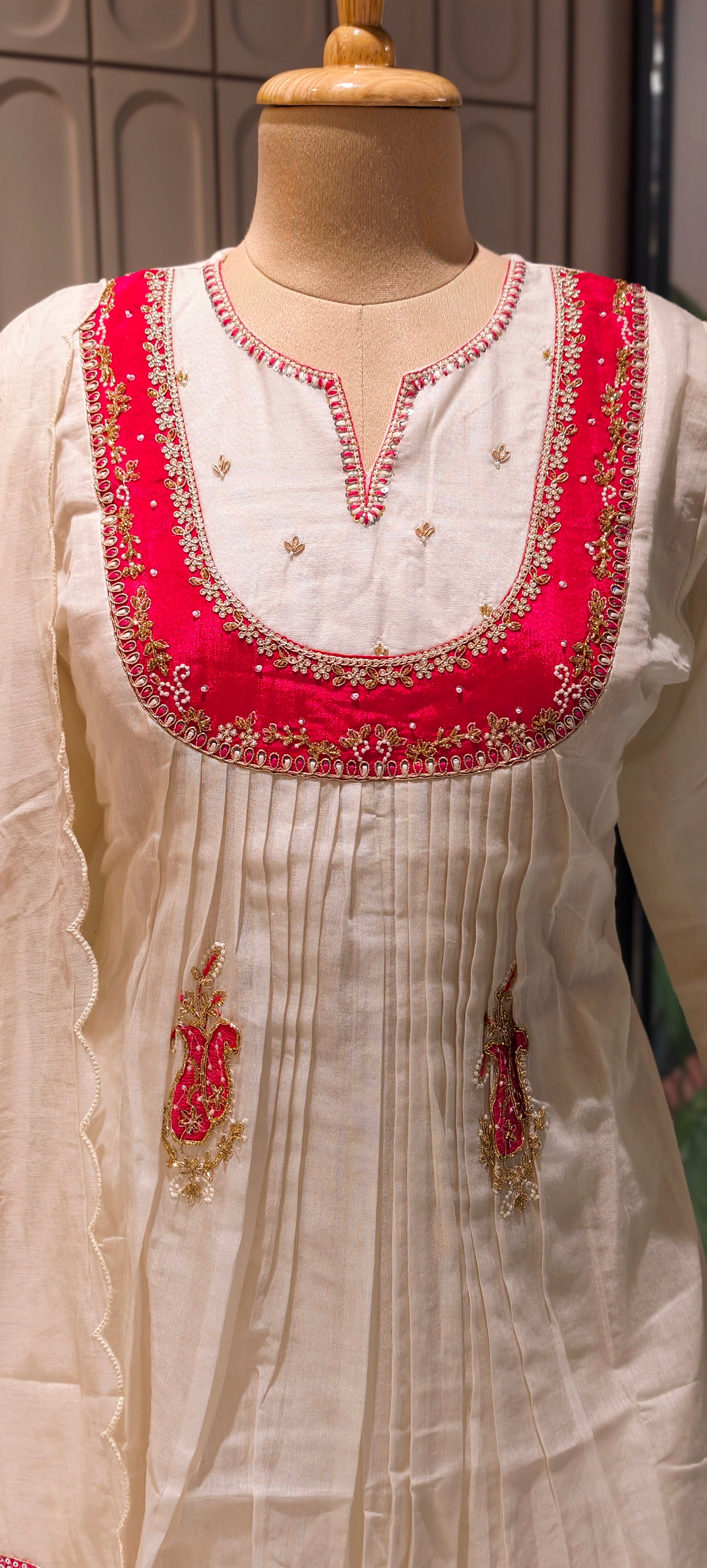 Elegant Ivory MulChanderi Peplum Style Kurta Suit Set with Hand-Embroidered Red Yoke and Festive Motifs-13858