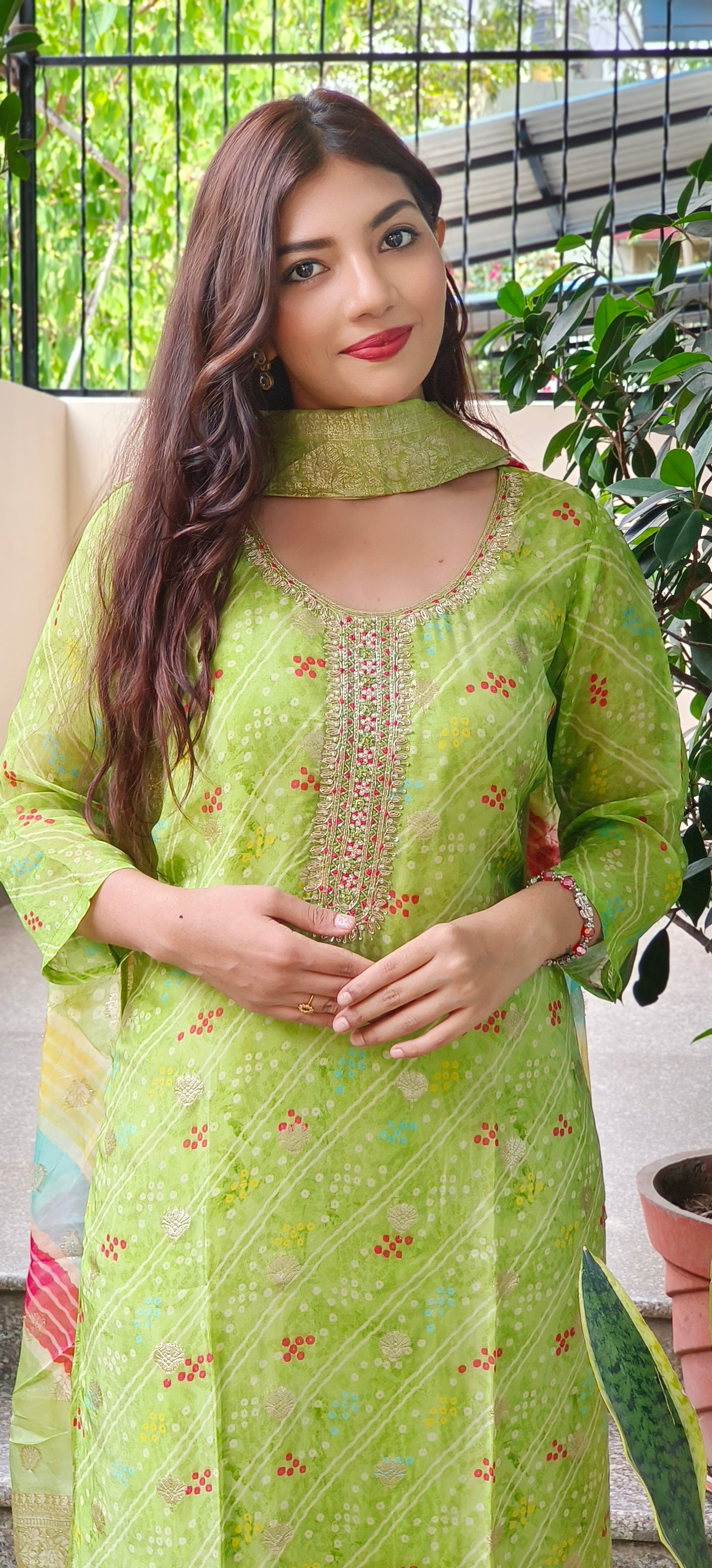 Luxurious Hand-Embroidered Green Organza Full Suit Set with Intricate Details With lehriya organza Dupatta DRYWASH DISPATCHING WILL BE FROM MONDAY-09408