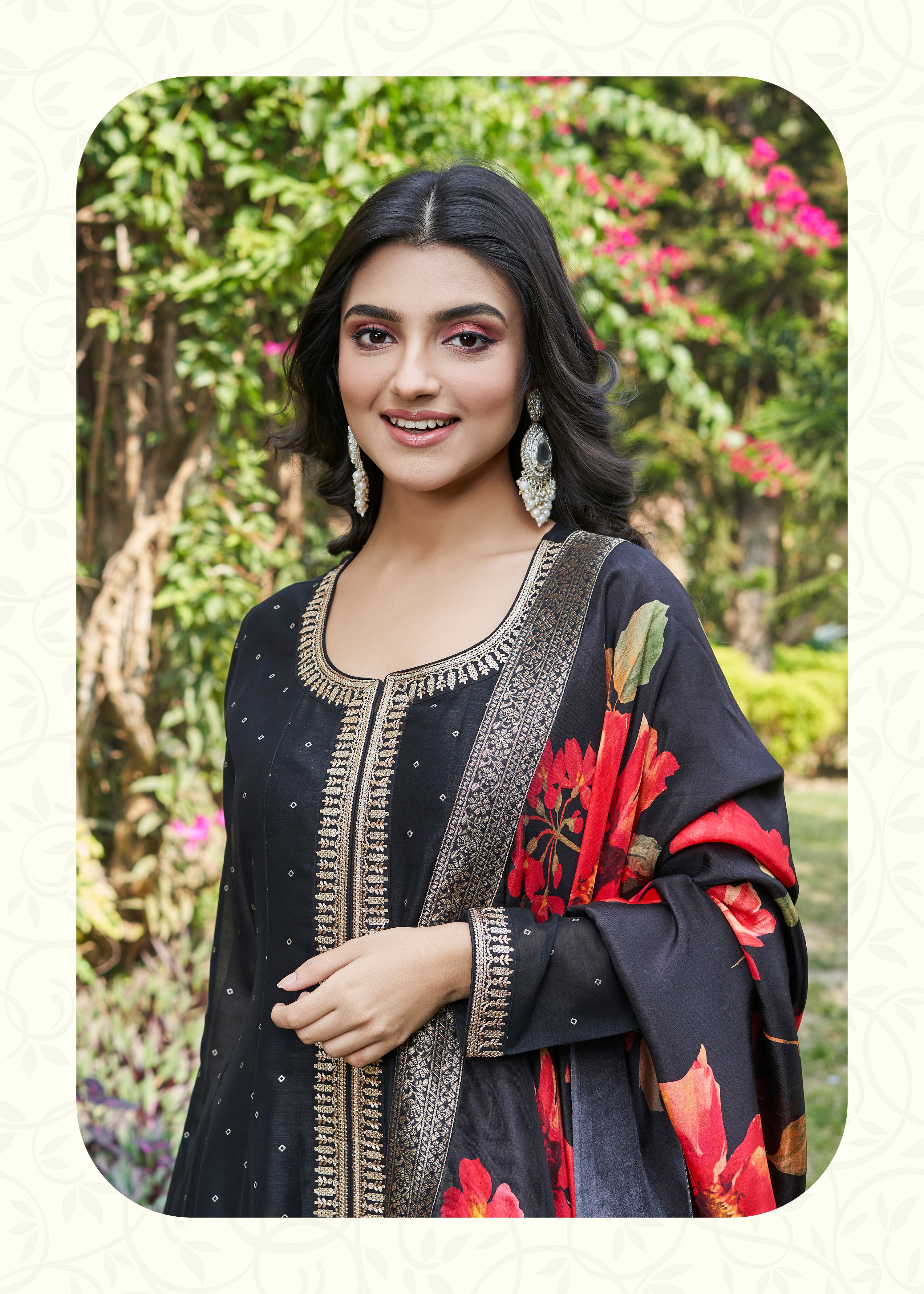 Graceful Black Silk Anarkali Suit with Vibrant Floral Dupatta