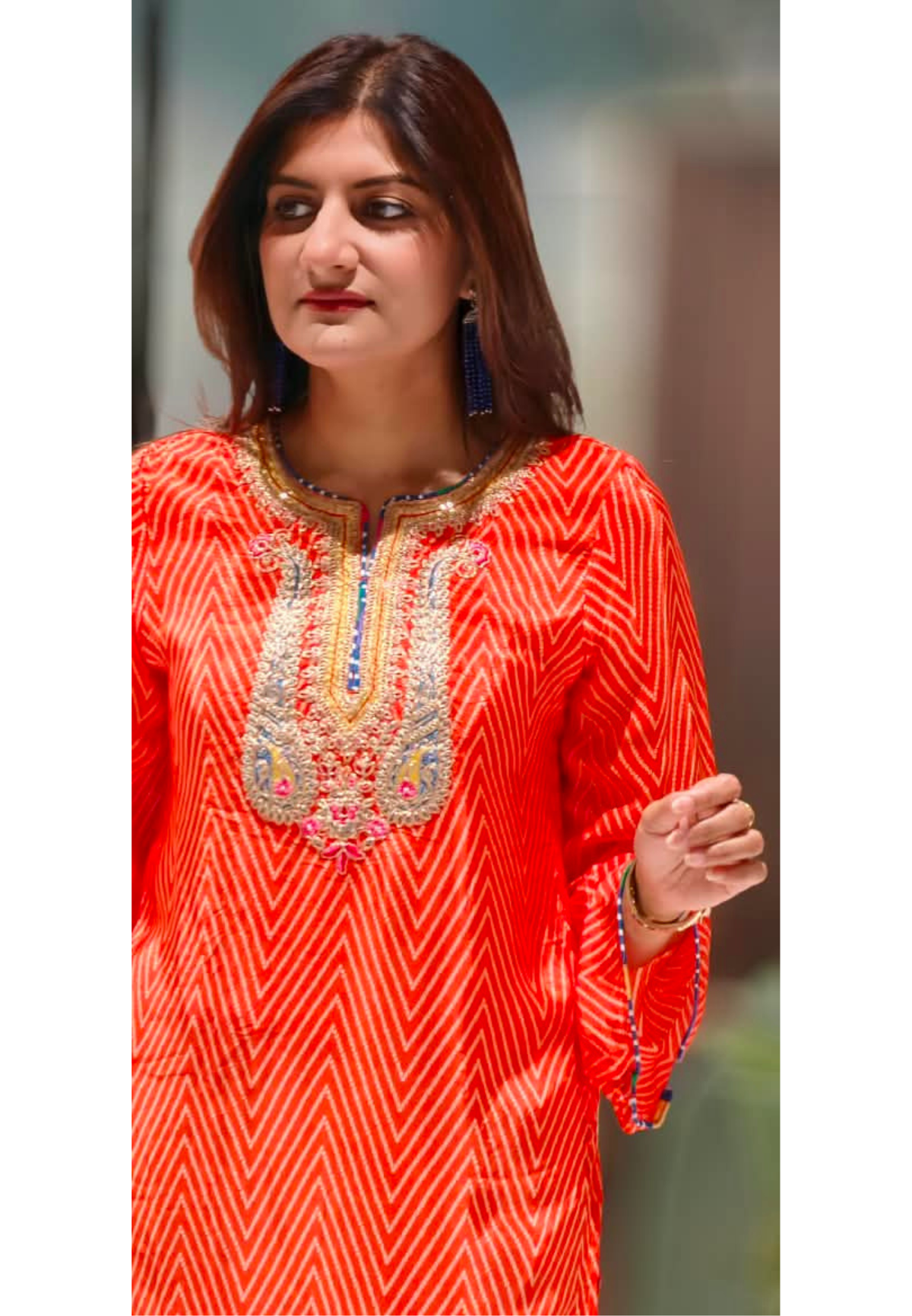 Orange Chevron Diagonal Printed Crepe Short Kurti With Intricate Heavy Embroidered Scoop Neckline and Multicolor Leheriya Farshi Salwar- 16993