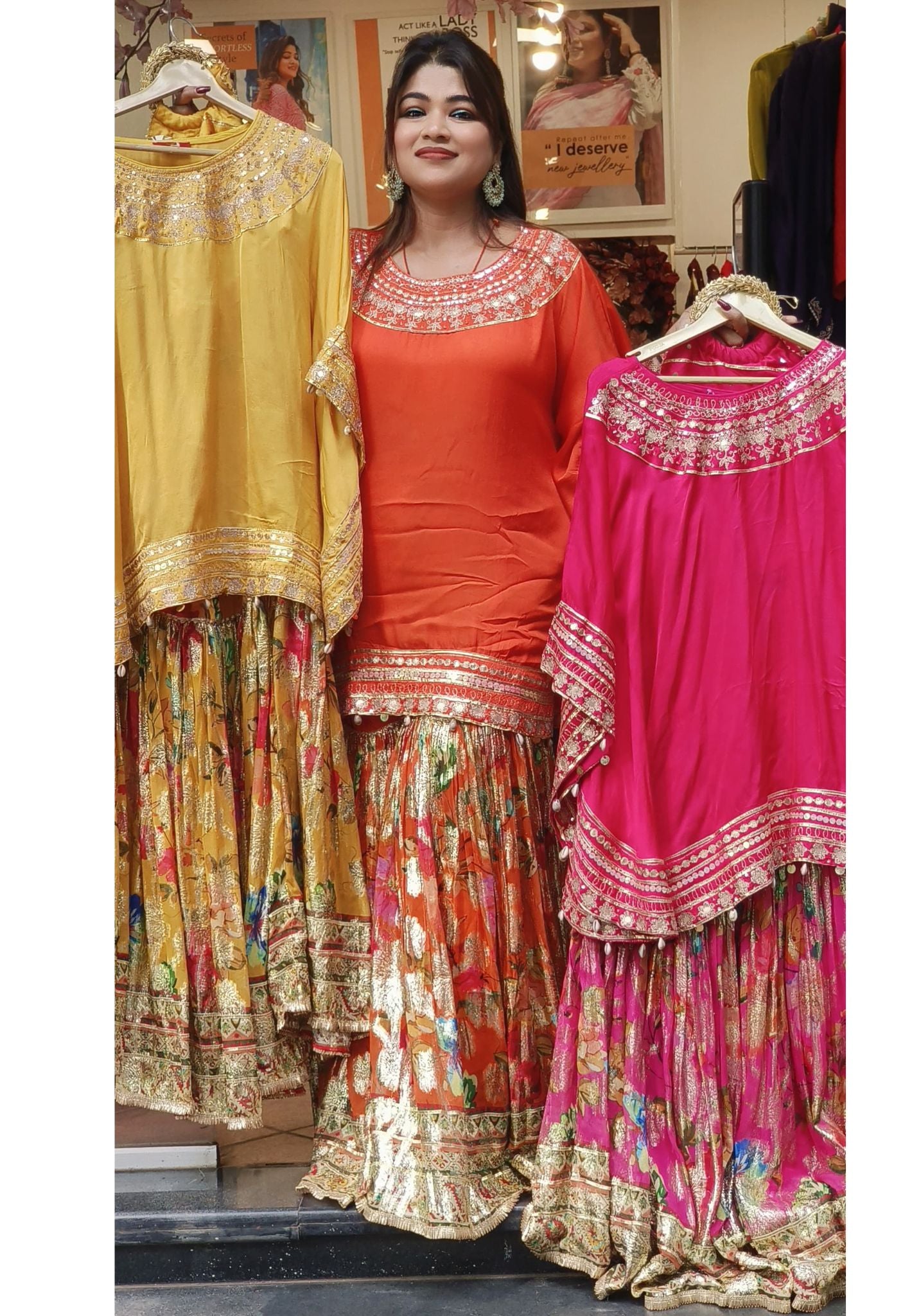 Embellished short Kaftan Top with Floral Print shimmer Sharara Set - Embroidered Neckline and Hem Detail, Mustard Base with Multi-Color Floral Pattern Bottom With Potali bag DRYWASH