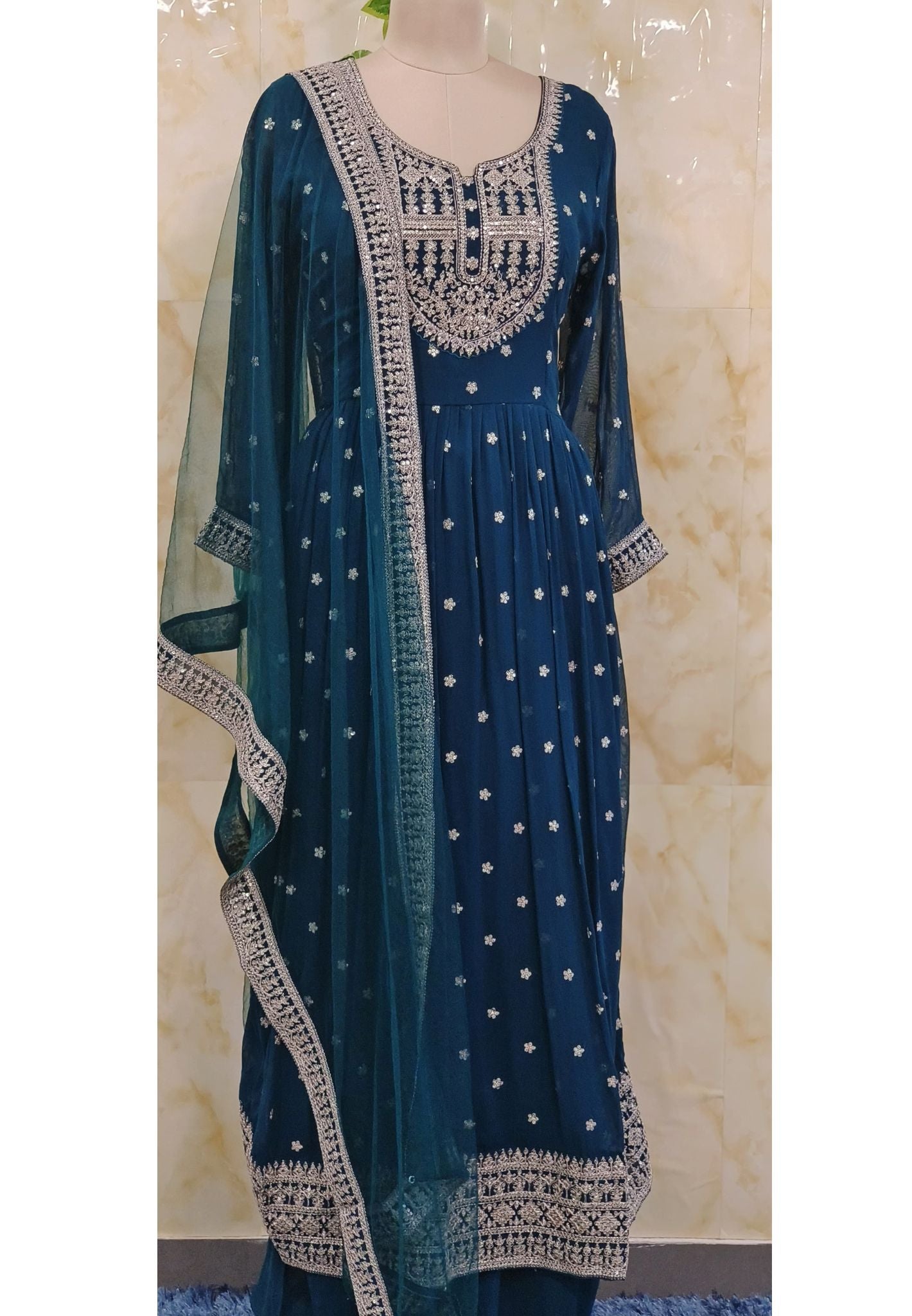 Soft georgette Tara Embroidered Nyra Cut Kurta with loose palazzo pants and Soft netted Dupatta