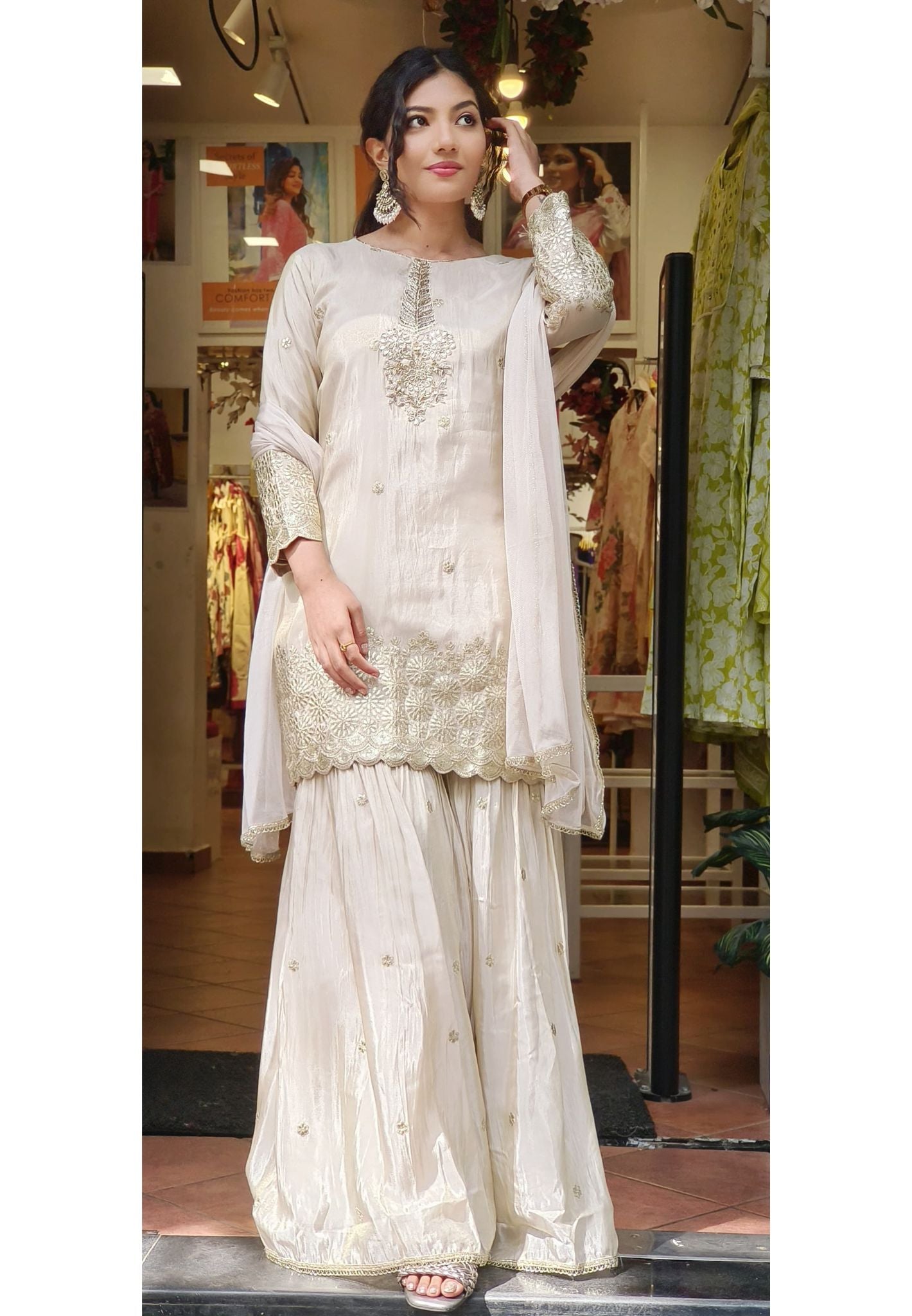 Graceful Ivory Shimmer Tissue Gotta Patti Embroidered Top with Matching Sharara and Netted Dupatta