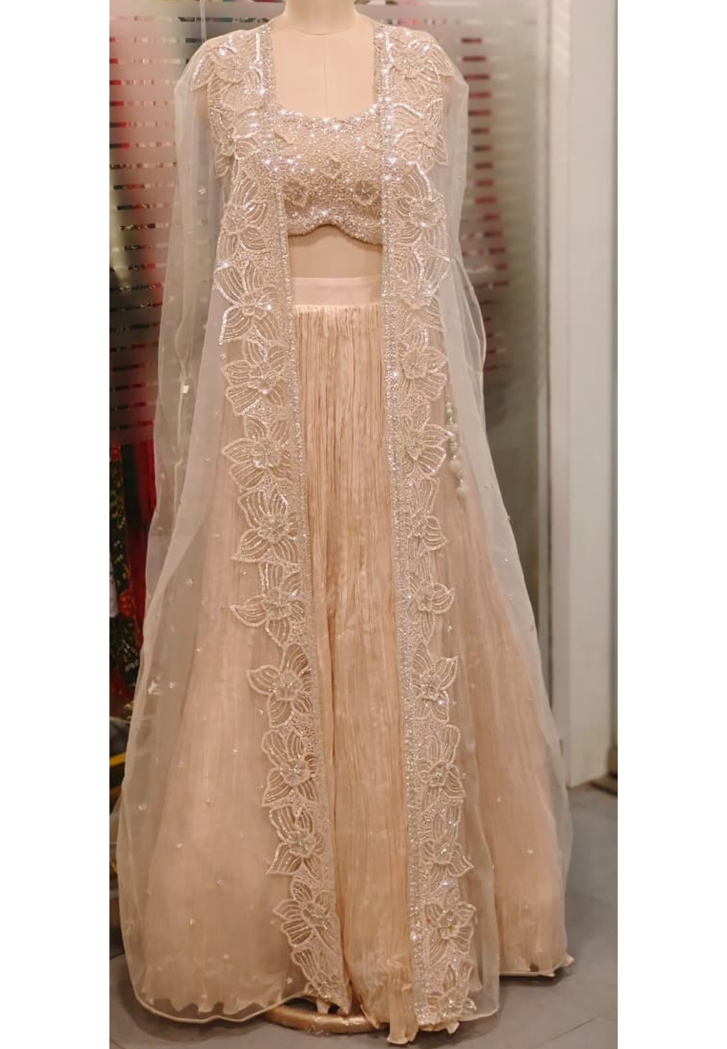 Stylish Sequence Embroidered Floral Cut Work Crop Top With Crushed Palazzo & Netted Shrug