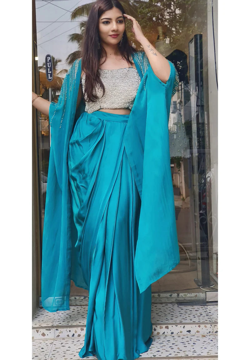 Swarovski-Embellished Top with Draped Skirt Set With organza shrug  A luxurious outfit featuring a sparkling Swarovski stone-studded blouse paired with an elegant drape-style skirt DRY WASH