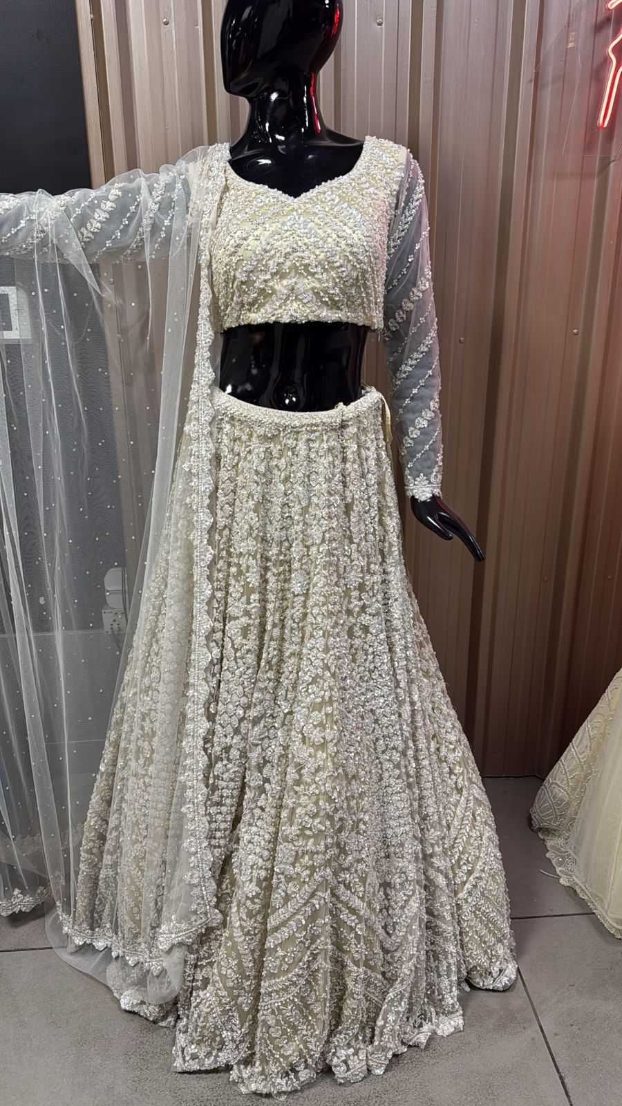 Ivory Dream: Luxurious Hand-Embroidered White Sequined Lehenga with Sheer Net Dupatta-Dispatching After 30 Days Only On Orders