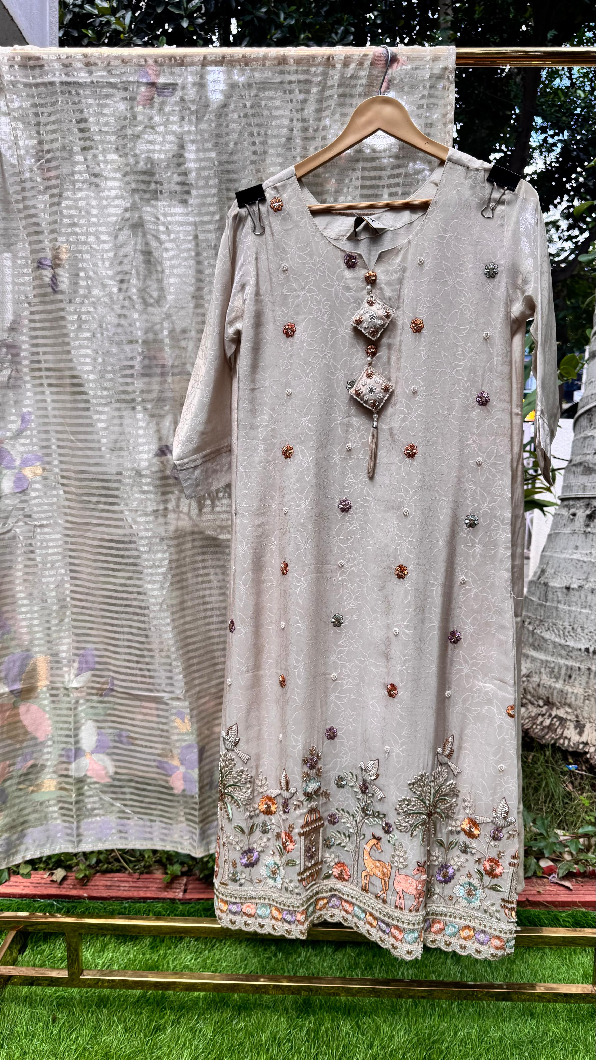 Ivory Meadow Garden & Figures Embroidered Handcrafted Full Suit Set With Dupatta In Tissue Fabric