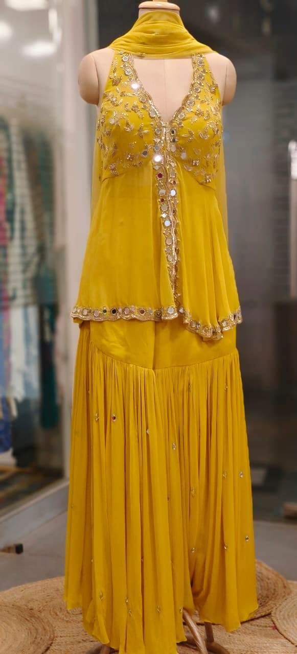 Graceful Real Mirror Sleeveless Front Slitted Short Kurta With Sharara Bottom & Dupatta In Georgette Fabric (Dispatching After 30 Days On Orders)