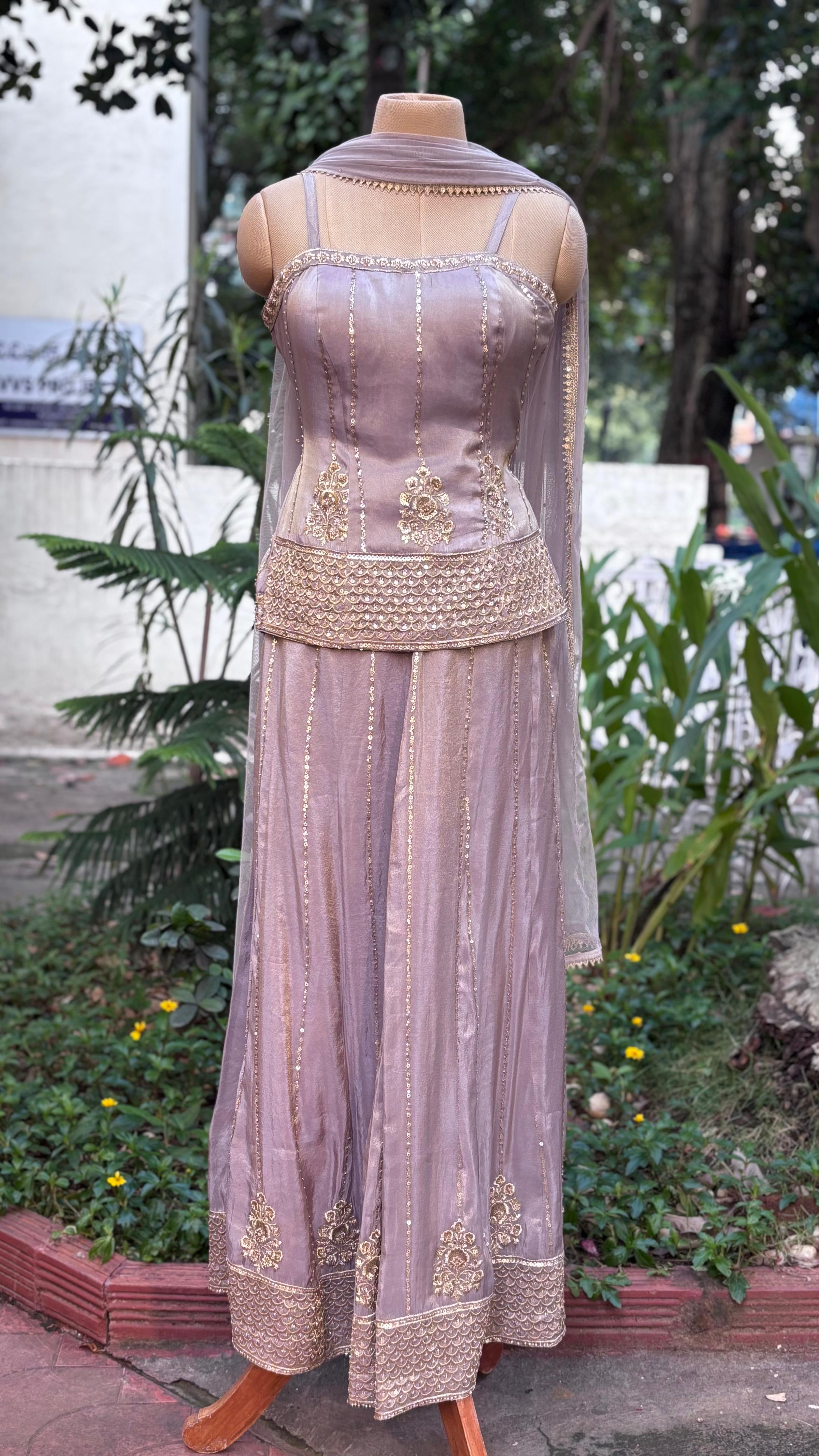 Zardosi Charm Tiny Foil Handwork Sleeveless Short Kurta With Loose Palazzo Bottom In Tissue Fabric & Netted Dupatta-