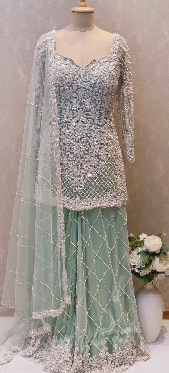 Premium Pastel Green Heavy Embellished Set Ensemble with Detailed Sequin–Pearl Work Kurta and Matching Embroidered Dupatta And Flare Bottom-12610 (DISPATCHING AFTER 30 DAYS ON ORDERS)
