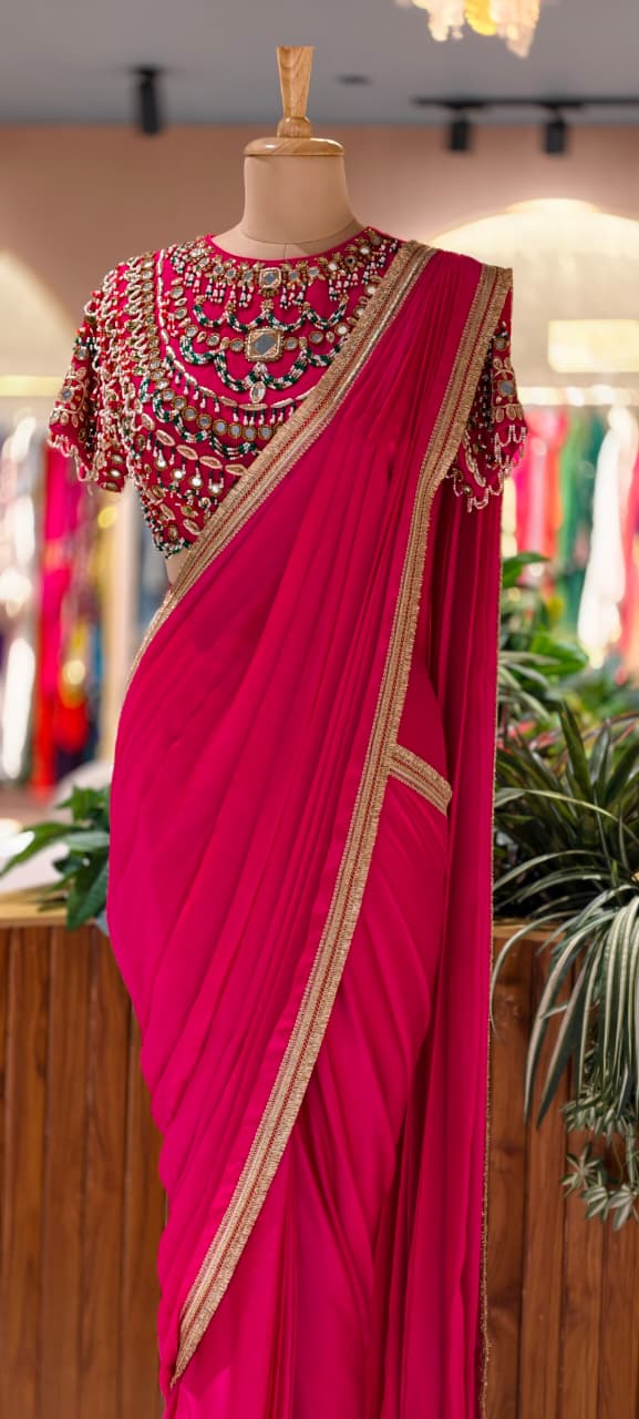 Rani Pink Pre-Draped Saree with Fine Gold Gotta Border Paired with Luxury Hand-Embroidered Jeweled Blouse Featuring Emerald & Polki Motifs- 14777