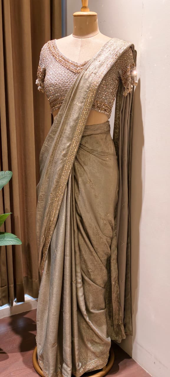 Metallic Gold-Taupe Shimmer Tissue Saree with Embellished Border paired with a Heavy Sequin and Pearl-Fringed Blouse- 14236