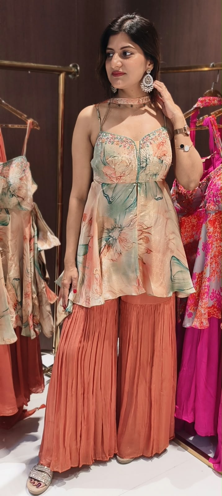 Soft Peach & Coral Floral Printed Noodle Strap Peplum Tunic Set with Pleated Sharara & Beaded Chowker Dupatta- 12759